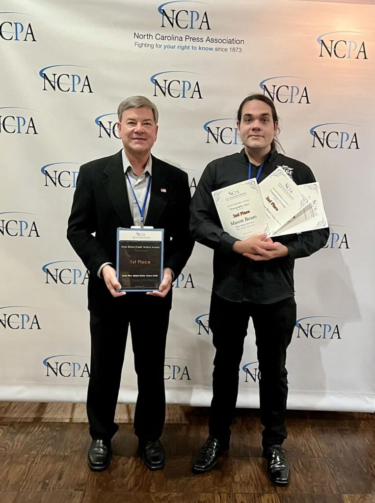 Rusty Wise (L) and Mason Beam (R) accepting the Mark Binker award and other awards at the NCPA Awards Ceremony. September 19th, 2024 by Anne Wise (WNN).